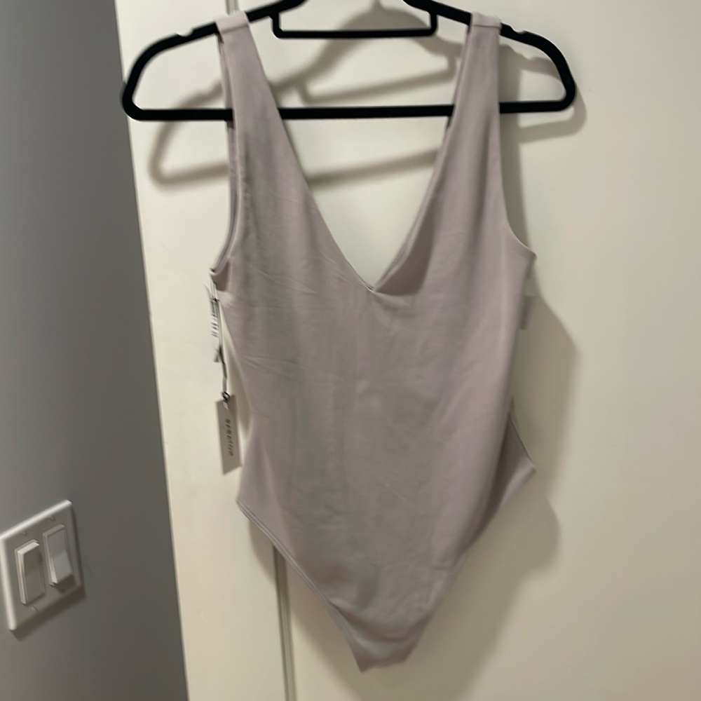 V neck thong bodysuit by babaton size l buy will fit m nwt retails 48 greyish